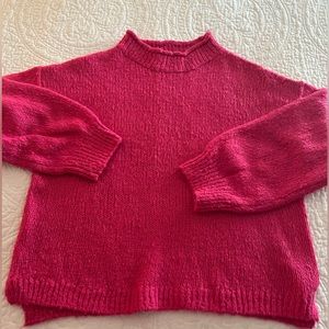 Fuchsia pink bulky sweater.